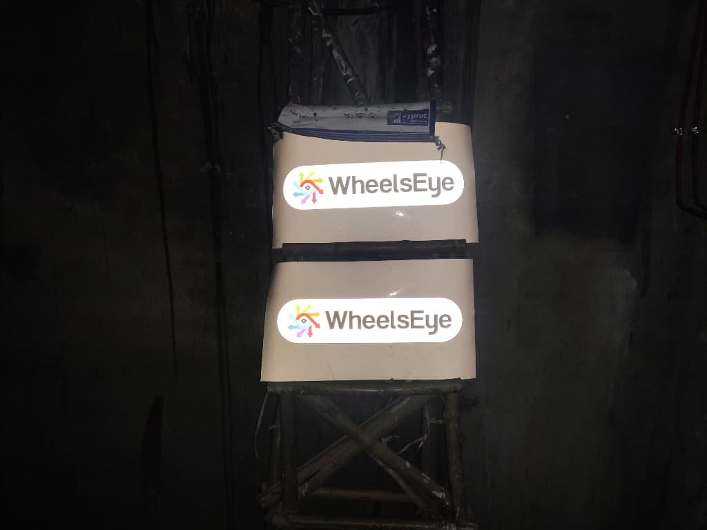 Reflective WheelsEye sticker samples on a testing rig showing the hexagonal lattice material